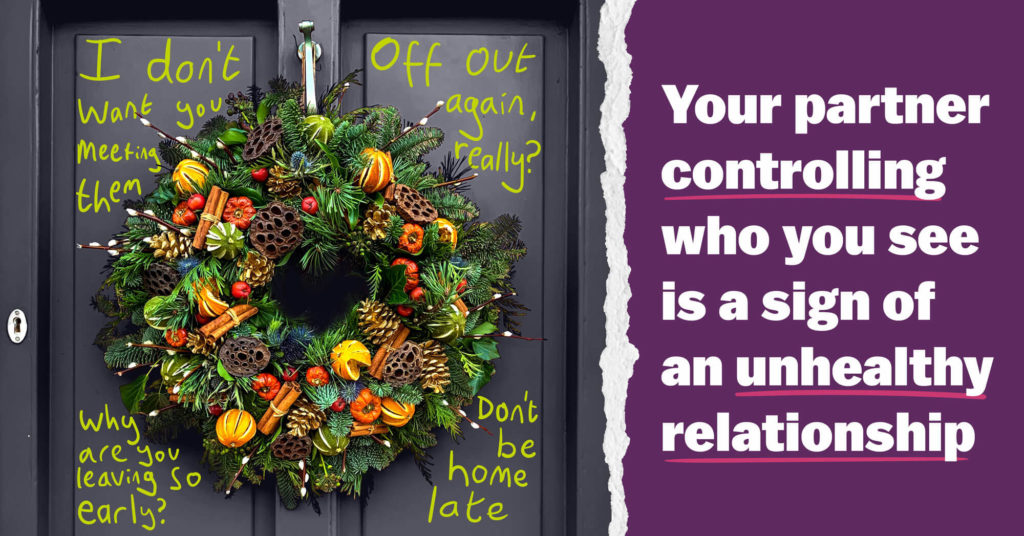 A wreath on a front door with the text - Your partner controlling who you see is a sign of an unhealthy relationship